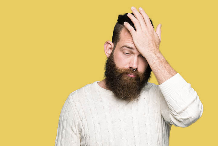 man who just made a beard mistake and looks disappointed