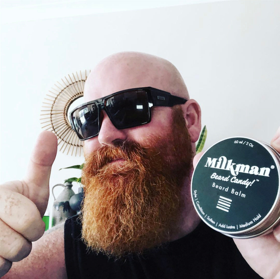man with epic beard and milkman beard candy beard balm
