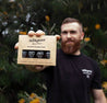4 pack beard oil sampler pack man holding