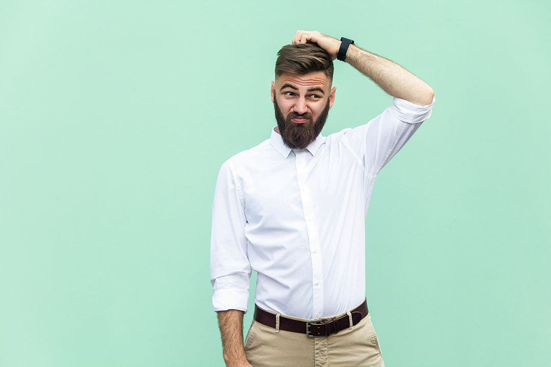 bearded man asking question