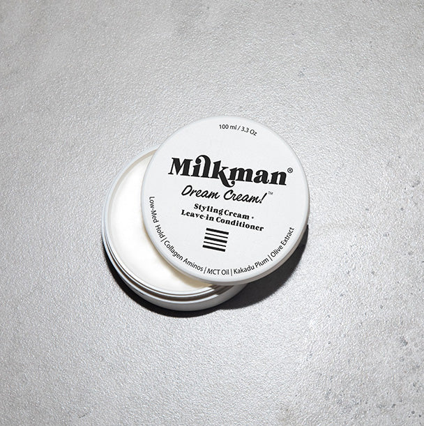 Dream Cream. hair styling cream by Milkman, on grey background