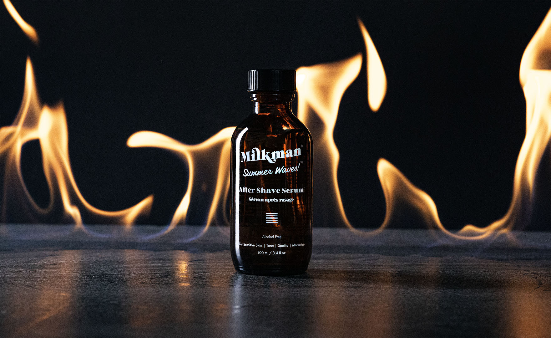 milkman after shave serum surrounded by flames depicting razor burn