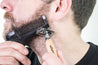 beard shaping tool in use